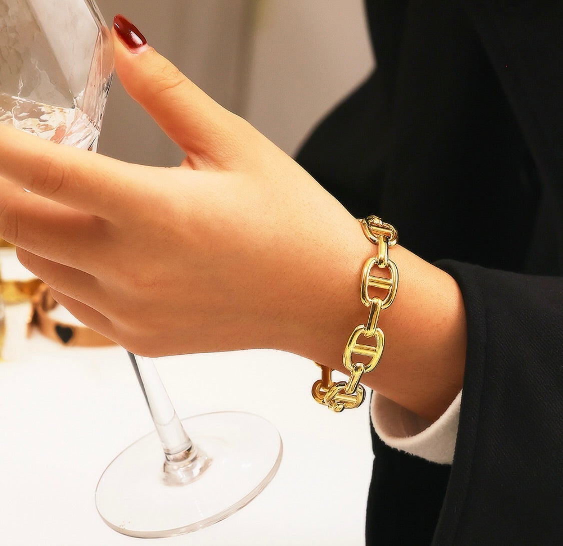 Gold Cuff Chain Bracelet by Tashyam